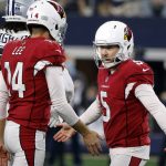 Arizona Cardinals kicker Matt Prater (5) celebrates his 53-yard field with Andy Lee (14) during the first half of an NFL football game against the Dallas Cowboys Sunday, Jan. 2, 2022, in Arlington, Texas. (AP Photo/Michael Ainsworth)
