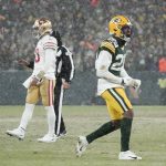 Green Bay Packers' Rasul Douglas reacts in front of San Francisco 49ers' Jimmy Garoppolo after a fourth down stop during the second half of an NFC divisional playoff NFL football game Saturday, Jan. 22, 2022, in Green Bay, Wis. (AP Photo/Morry Gash)