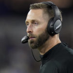 Arizona Cardinals head coach Kliff Kingsbury watches during the first half of an NFL wild-card playoff football game against the Los Angeles Rams in Inglewood, Calif., Monday, Jan. 17, 2022. (AP Photo/Jae C. Hong)