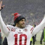 San Francisco 49ers' Jimmy Garoppolo celebrates after an NFC divisional playoff NFL football game Saturday, Jan. 22, 2022, in Green Bay, Wis. The 49ers won 13-10 to advance to the NFC Chasmpionship game. (AP Photo/Matt Ludtke)
