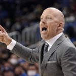 UCLA head coach Mick Cronin gestures during the first half of an NCAA college basketball game against Arizona Tuesday, Jan. 25, 2022, in Los Angeles. (AP Photo/Mark J. Terrill)