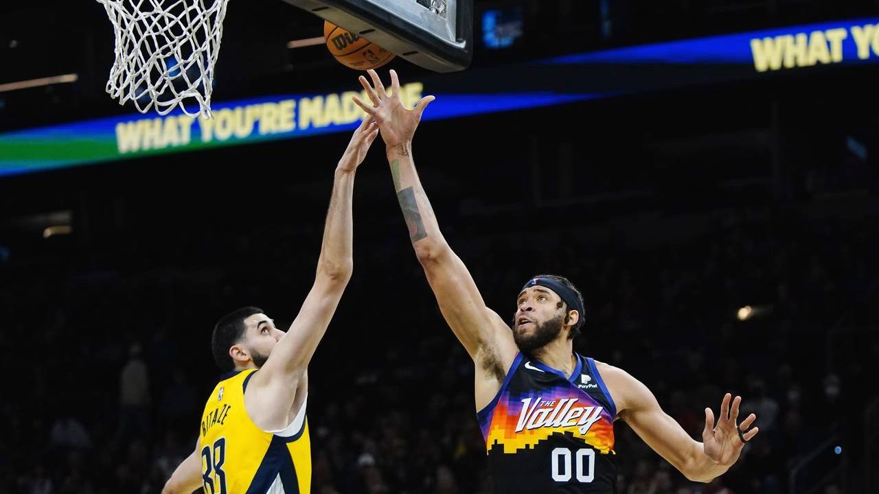 Phoenix Suns center JaVale McGee (00) shoots over Indiana Pacers center Goga Bitadze (88) during th...