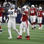 Arizona Cardinals running back Chase Edmonds (2) signals for a first down after a run against the Dallas Cowboys during the second half of an NFL football game Sunday, Jan. 2, 2022, in Arlington, Texas. (AP Photo/Michael Ainsworth)