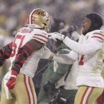 San Francisco 49ers' Azeez Al-Shaair and Dre Greenlaw celebrate after an NFC divisional playoff NFL football game against the Green Bay Packers Saturday, Jan. 22, 2022, in Green Bay, Wis. The 49ers won 13-10 to advance to the NFC Chasmpionship game. (AP Photo/Matt Ludtke)