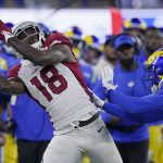 Arizona Cardinals wide receiver A.J. Green (18) cannot catch a pass in bounds while being defended by Los Angeles Rams defensive back David Long Jr. during the first half of an NFL wild-card playoff football game in Inglewood, Calif., Monday, Jan. 17, 2022. (AP Photo/Mark J. Terrill)