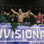 Fans cheer during the first half of an NFC divisional playoff NFL football game between the Green Bay Packers and the San Francisco 49ers Saturday, Jan. 22, 2022, in Green Bay, Wis. (AP Photo/Morry Gash)