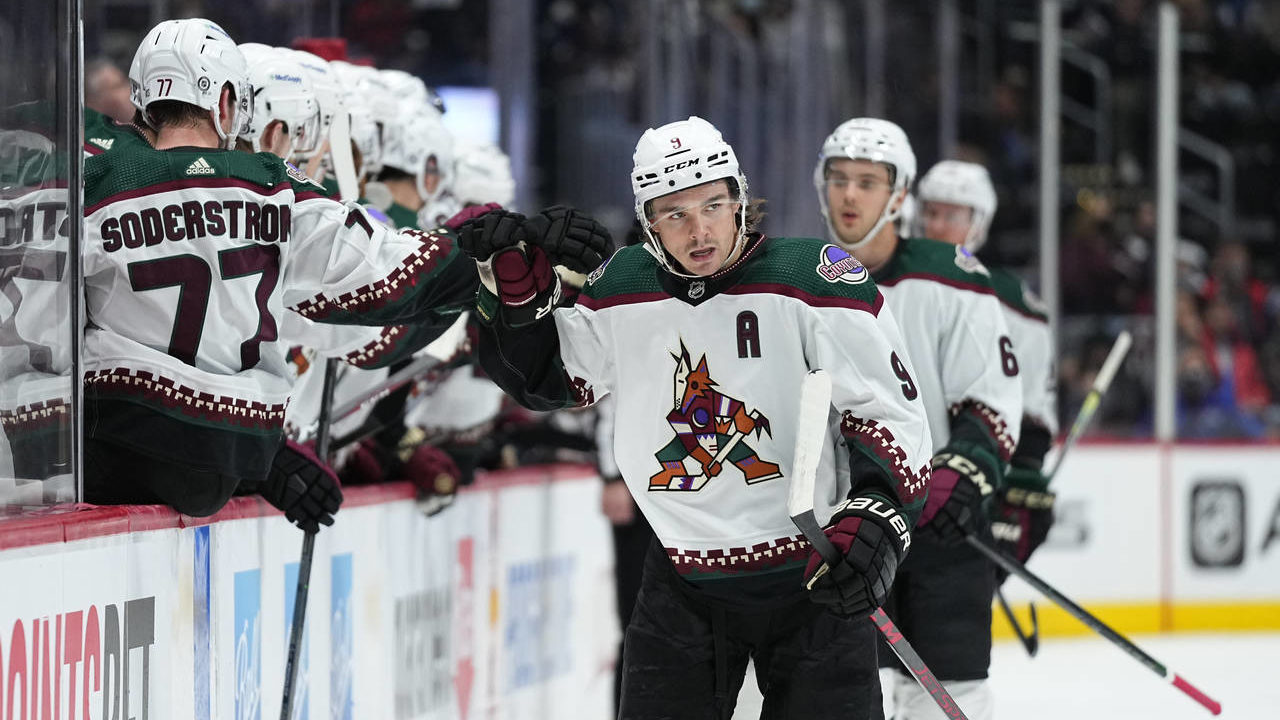 Arizona Coyotes right wing Clayton Keller celebrates a goal against the Colorado Avalanche with tea...