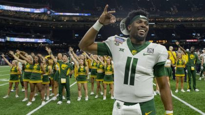 Baylor quarterback Gerry Bohanon (11) smiles as the band plays the school song after the Sugar Bowl...