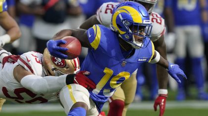 Los Angeles Rams wide receiver Brandon Powell (19) is tackled by San Francisco 49ers linebacker Cur...
