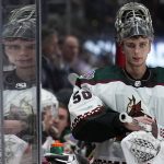 Arizona Coyotes goaltender Ivan Prosvetov looks on against the Colorado Avalanche during the third period of an NHL hockey game Friday, Jan. 14, 2022, in Denver. (AP Photo/Jack Dempsey)