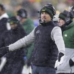 Green Bay Packers head coach Matt LaFleur tries to get the crowd going during the second half of an NFC divisional playoff NFL football game against the San Francisco 49ers Saturday, Jan. 22, 2022, in Green Bay, Wis. (AP Photo/Matt Ludtke)