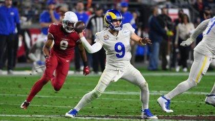 Matthew Stafford #9 of the Los Angeles Rams throws the ball against the Arizona Cardinals at State ...