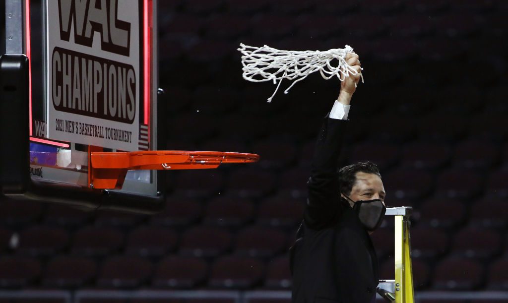 Head coach Bryce Drew of the Grand Canyon Lopes cuts down the net after defeating the New Mexico St...