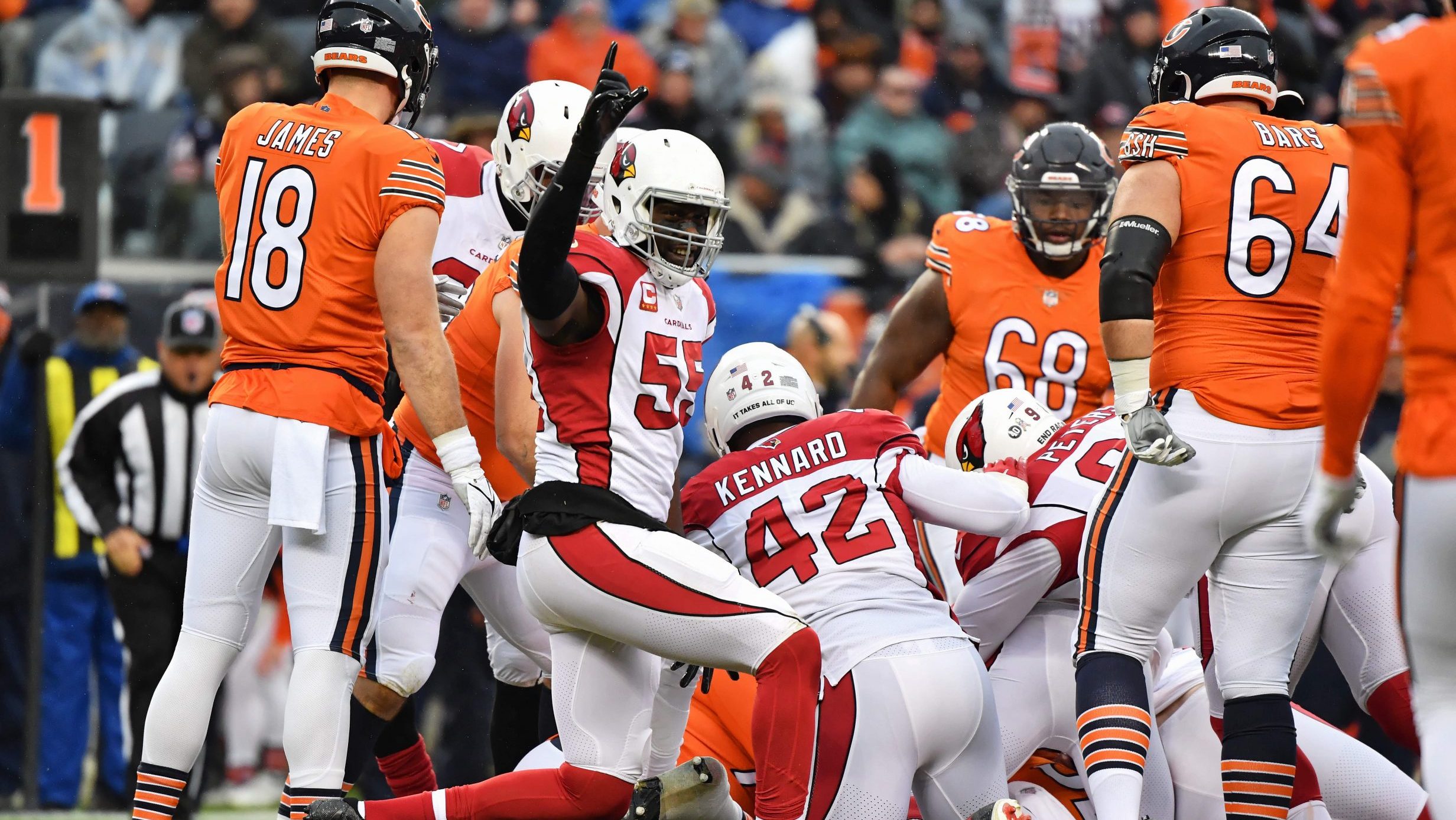 Chandler Jones #55 of the Arizona Cardinals celebrates a tackle against the Chicago Bears at Soldie...