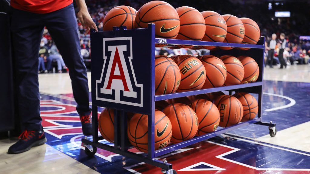 Basketballs are rolled off the court during the NCAAB game at McKale Center on January 03, 2022 in ...