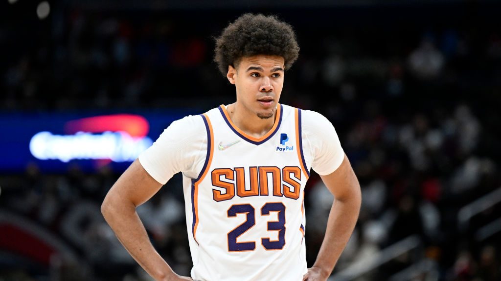 Cameron Johnson #23 of the Phoenix Suns rests during a break in the game against the Washington Wiz...
