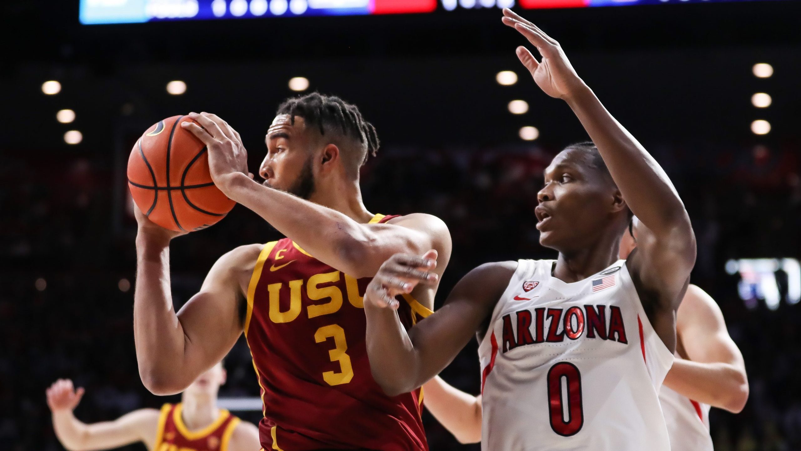 TUCSON, ARIZONA - FEB. 05: Forward Isaiah Mobley #3 of the USC Trojans looks for an open teammate i...