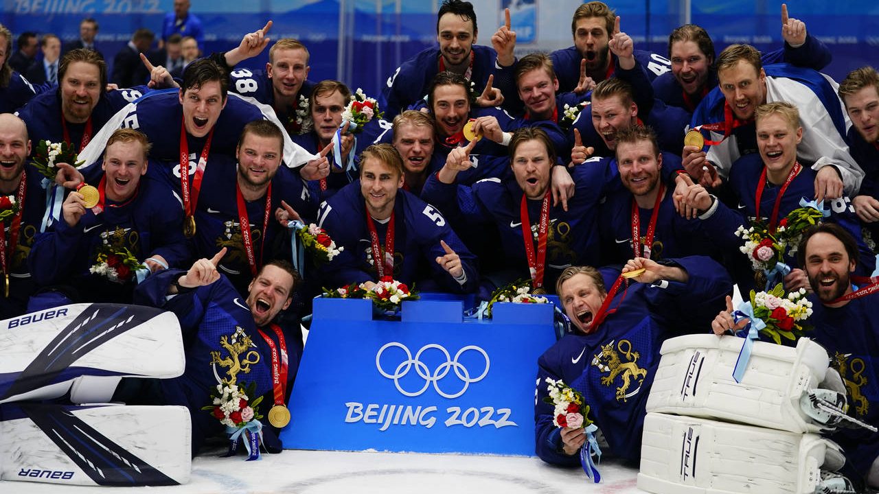 Finland players celebrate after defeating Russian Olympic Committee in the men's gold medal hockey ...