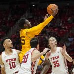 Arizona State guard Jay Heath (5) goes to the basket as Utah's Marco Anthony (10), Lazar Stefanovic (20) and Branden Carlson (35) defend during the first half of an NCAA college basketball game Saturday, Feb. 26, 2022, in Salt Lake City. (AP Photo/Rick Bowmer)