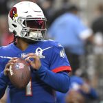 NFC quarterback Kyler Murray (1), of the Arizona Cardinals, warms up before the Pro Bowl NFL football game against the AFC, Sunday, Feb. 6, 2022, in Las Vegas. (AP Photo/David Becker)