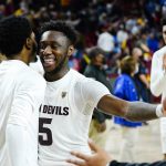 Arizona State guard Jay Heath (5) smiles as he celebrates the team's win against UCLA in three overtimes in an NCAA college basketball game Saturday, Feb. 5, 2022, in Tempe, Ariz. Arizona State won 87-84. (AP Photo/Ross D. Franklin)