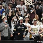 Fans cheer in the second half of an NCAA college basketball game betwen Arizona and Colorado, Saturday, Feb. 26 2022, in Boulder, Colo. (AP Photo/David Zalubowski)