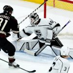 Los Angeles Kings goaltender Cal Petersen (40) makes a save on a shot by Arizona Coyotes right wing Phil Kessel (81) during the third period of an NHL hockey game Wednesday, Feb. 23, 2022, in Glendale, Ariz. The Kings won 3-2. (AP Photo/Ross D. Franklin)