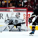Los Angeles Kings goaltender Cal Petersen (40) makes a save on a shot by Arizona Coyotes center Riley Nash (20) during the second period of an NHL hockey game Wednesday, Feb. 23, 2022, in Glendale, Ariz. (AP Photo/Ross D. Franklin)