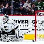 Los Angeles Kings goaltender Cal Petersen pauses on the ice after giving up a goal to Arizona Coyotes' Lawson Crouse during the second period of an NHL hockey game Saturday, Feb. 19, 2022, in Glendale, Ariz. (AP Photo/Ross D. Franklin)