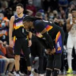 Phoenix Suns forward Jae Crowder reacts after turning the ball over in the finals seconds of the second half of an NBA basketball game against the Utah Jazz, Sunday, Feb. 27, 2022, in Phoenix. The Jazz defeated the Suns 118-114. (AP Photo/Matt York)
