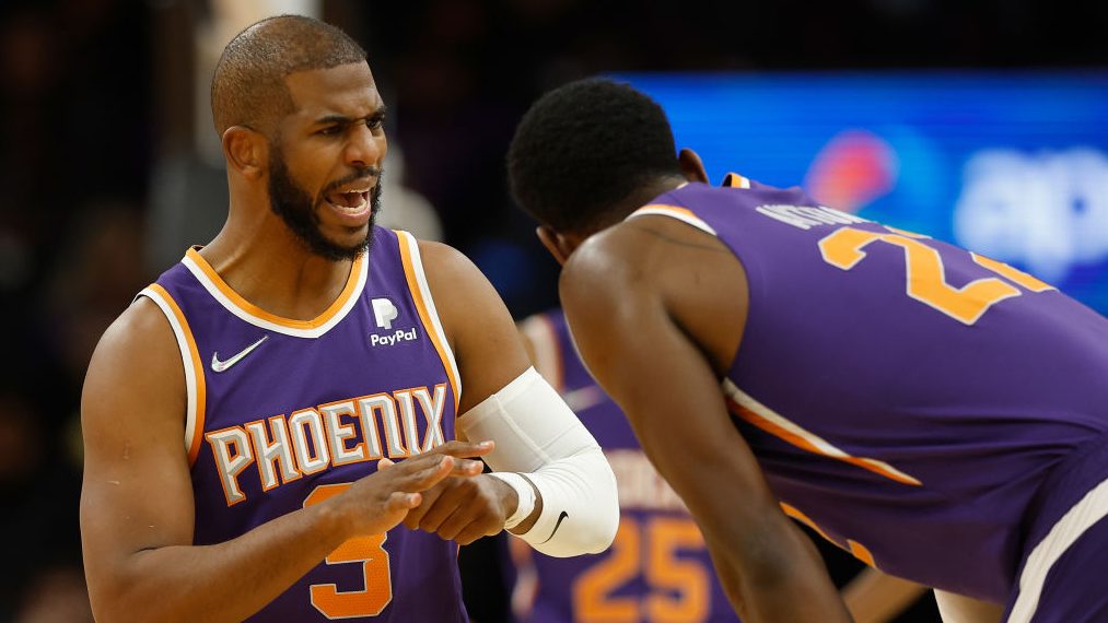 Chris Paul #3 of the Phoenix Suns reacts after an injury to his hand and a technical-foul during th...