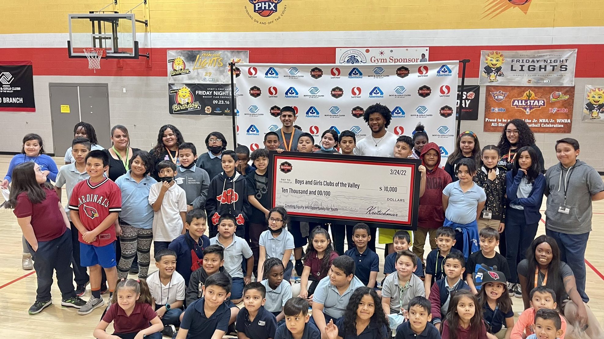 Cardinals QB Kyler Murray presents a check to the Boys & Girls Club of the Valley on Thursday, Marc...