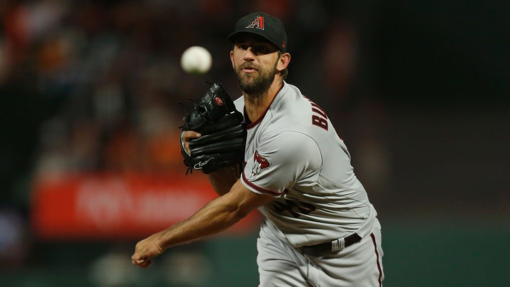 Madison Bumgarner #40 of the Arizona Diamondbacks pitches in the bottom of the first inning against...