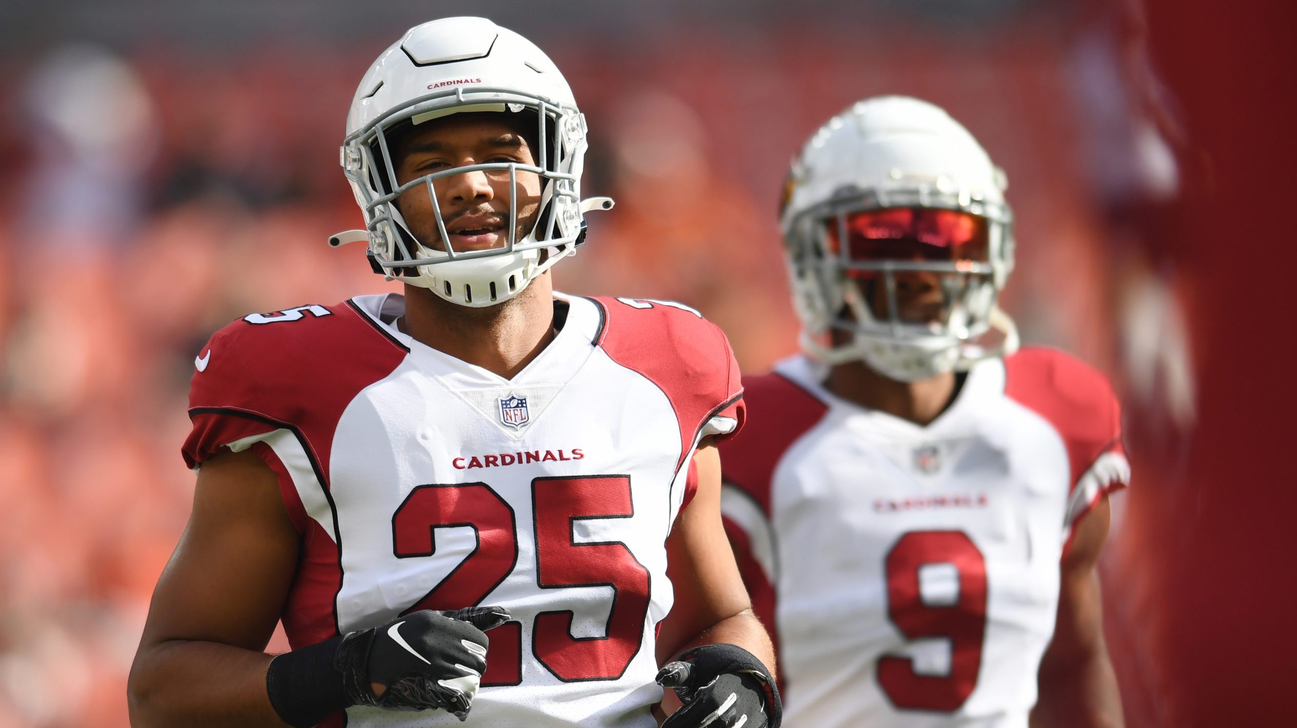 Zaven Collins #25 of the Arizona Cardinals warms up prior to the game against the Cleveland Browns ...