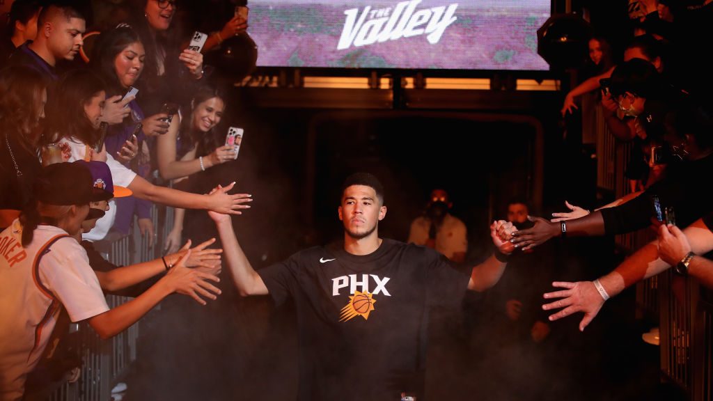 Devin Booker #1 of the Phoenix Suns is introduced before the NBA game at Footprint Center on Octobe...