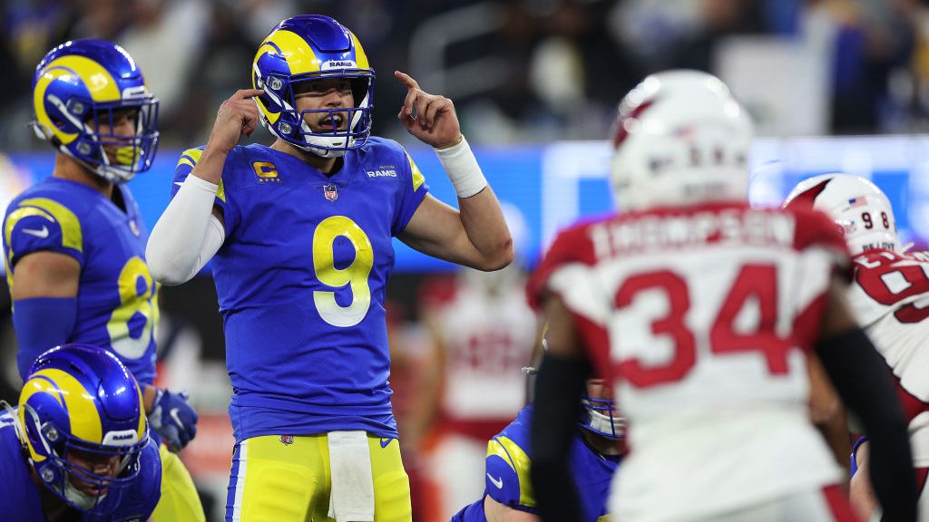 Matthew Stafford #9 of the Los Angeles Rams reacts at the line of scrimmage against the Arizona Car...