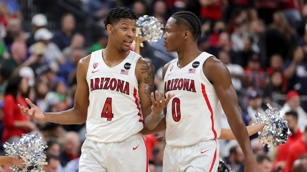 Dalen Terry #4 and Bennedict Mathurin #0 of the Arizona Wildcats talk during a break in their game ...