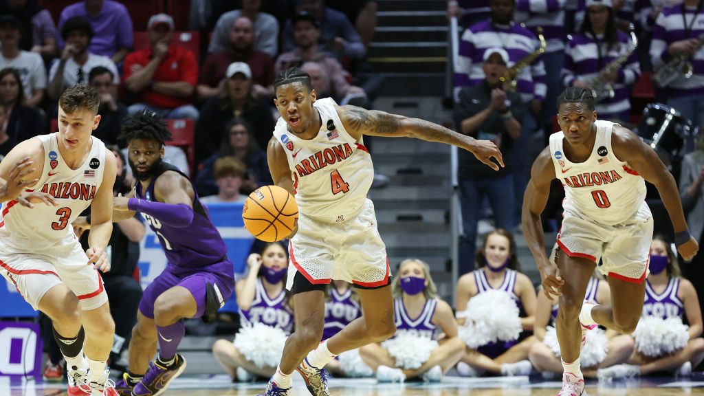 Dalen Terry #4 of the Arizona Wildcats dribbles during the second half against the TCU Horned Frogs...