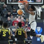 Colorado's Jabari Walker (12) dunks against Oregon during the first half of an NCAA college basketball game in the quarterfinal round of the Pac-12 tournament Thursday, March 10, 2022, in Las Vegas. (AP Photo/John Locher)