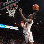 Arizona guard Bennedict Mathurin goes up for a dunk against Stanford during the second half of an NCAA college basketball game Thursday, March 3, 2022, in Tucson, Ariz. Arizona won 81-69. (AP Photo/Rick Scuteri)
