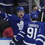 Toronto Maple Leafs right wing William Nylander (88) celebrates his game-tying goal against the Arizona Coyotes during the third period of an NHL hockey game Thursday, March 10, 2022, in Toronto. (Frank Gunn/The Canadian Press via AP)