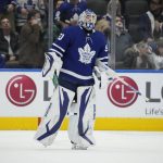 Toronto Maple Leafs goaltender Erik Kallgren (50) skates off the ice after he gave up the winning goal in overtime to Arizona Coyotes defenseman Jakob Chychrun during NHL hockey game action in Toronto, Ontario, Thursday, March 10, 2022. (Frank Gunn/The Canadian Press via AP)