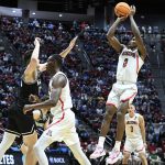 Arizona guard Bennedict Mathurin (0) shoots against Wright State during the second half of a first-round NCAA college basketball tournament game, Friday, March 18, 2022, in San Diego. Arizona won 87-70. (AP Photo/Denis Poroy)