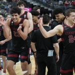 Stanford players celebrate after defeating Arizona State in an NCAA college basketball game in the first round of the Pac-12 tournament Wednesday, March 9, 2022, in Las Vegas. (AP Photo/John Locher)