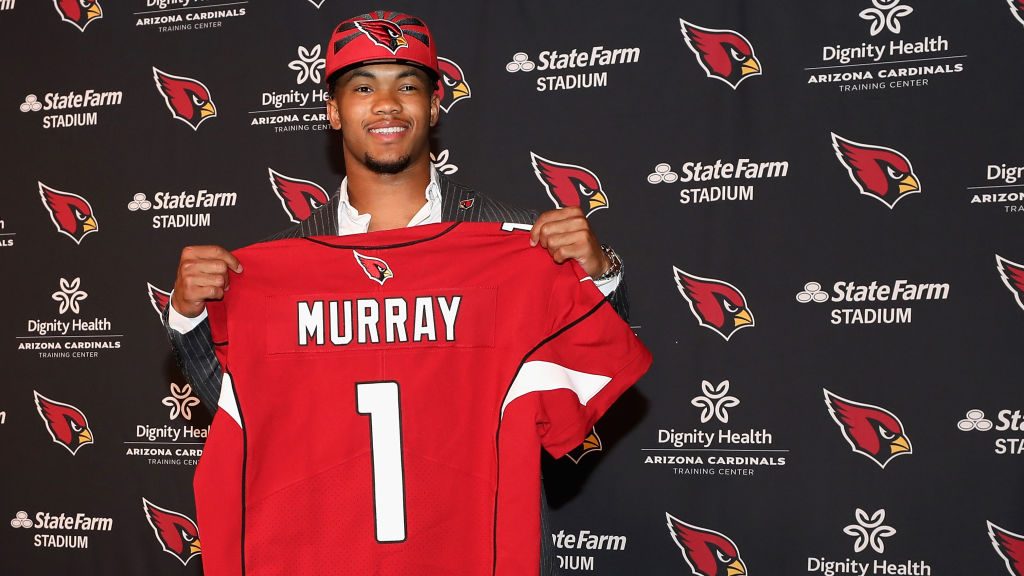 Quarterback Kyler Murray of the Arizona Cardinals poses during a press conference at the Dignity He...