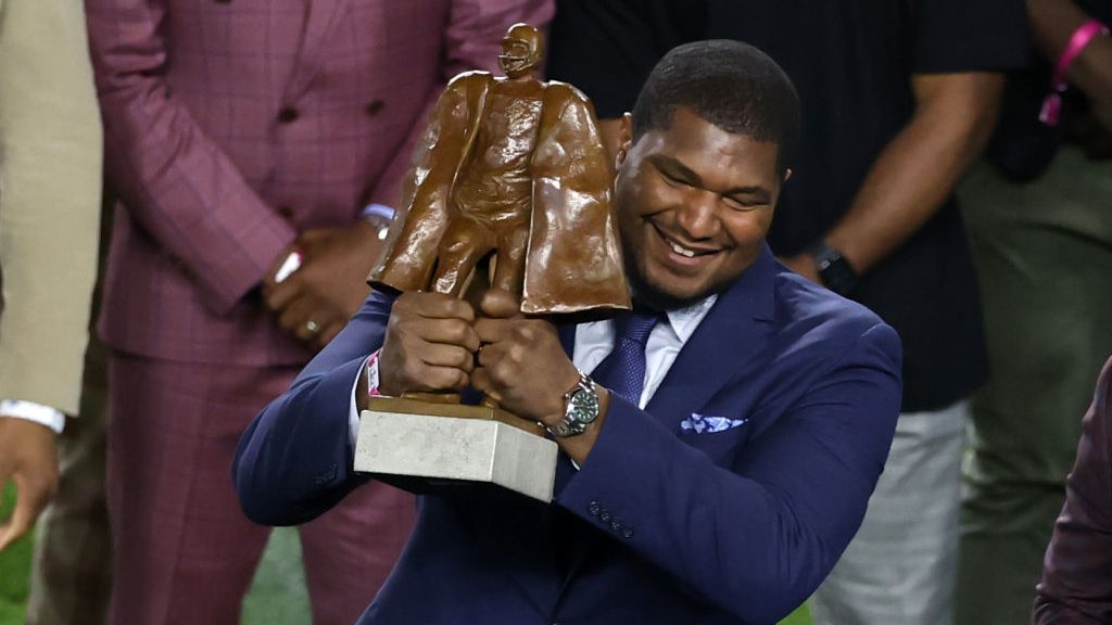 Calais Campbell is awarded the Walter Payton NFL Man of the Year Award prior to Super Bowl LIV betw...