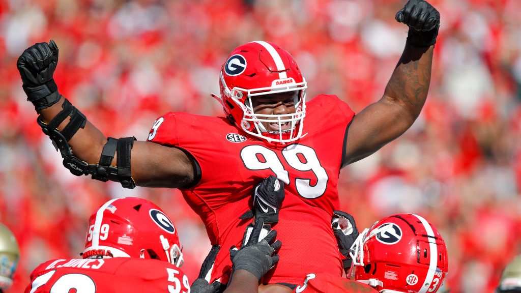 Jordan Davis #99 of the Georgia Bulldogs reacts after rushing in for a touchdown during the first h...