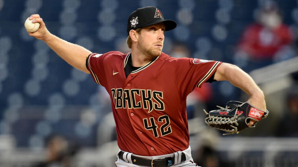 Merrill Kelly #29 of the Arizona Diamondbacks pitches in the first inning against the Washington Na...