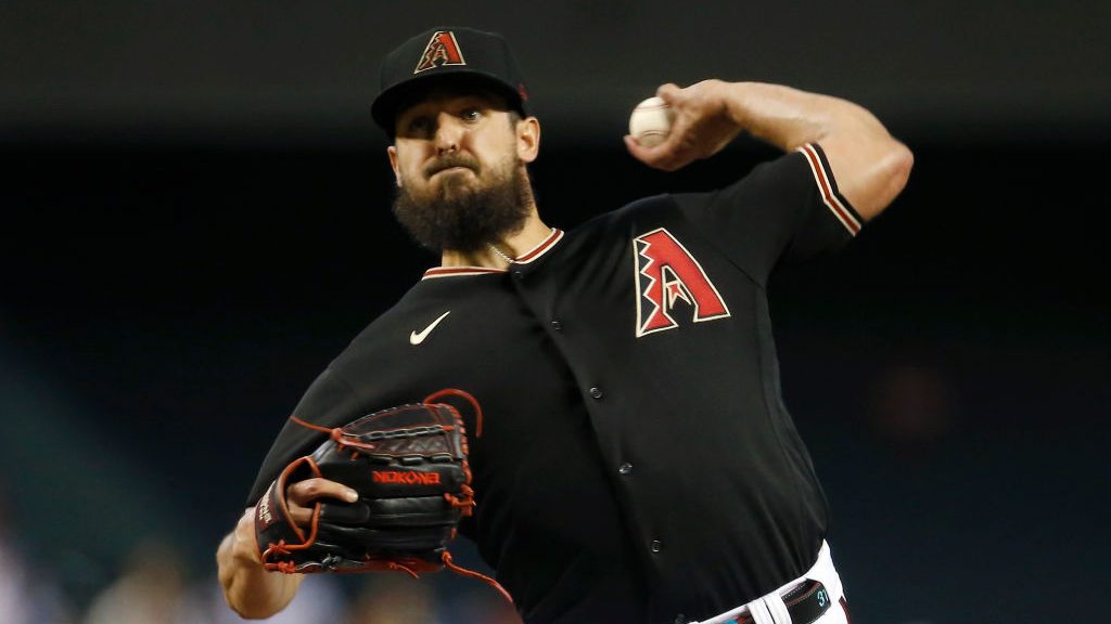 Starting pitcher Caleb Smith #31 of the Arizona Diamondbacks throws against the Los Angeles Angels ...