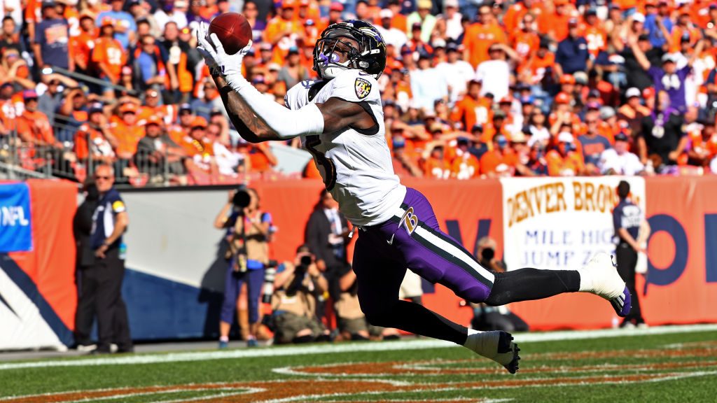 Marquise Brown #5 of the Baltimore Ravens makes a touchdown reception in the second quarter against...